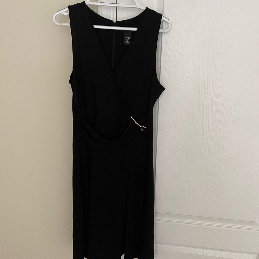 Black dress with side gold clip